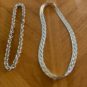 Two sterling silver necklaces.